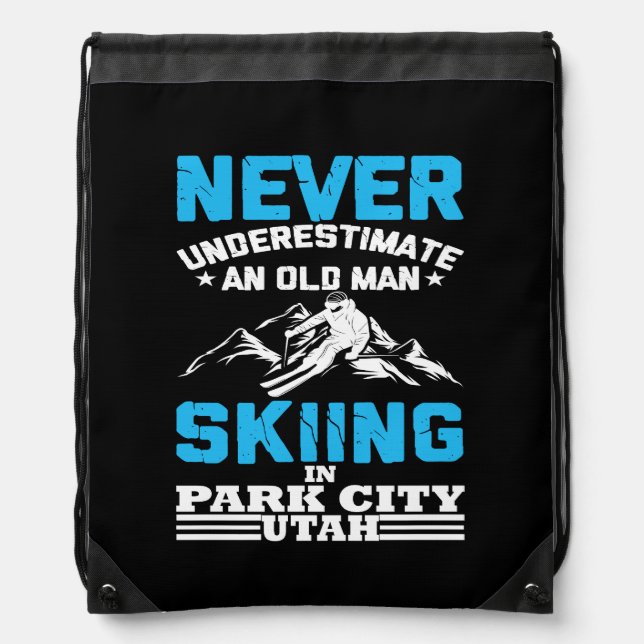 Never underestimate an old man skiing in Utah Drawstring Bag (Front)