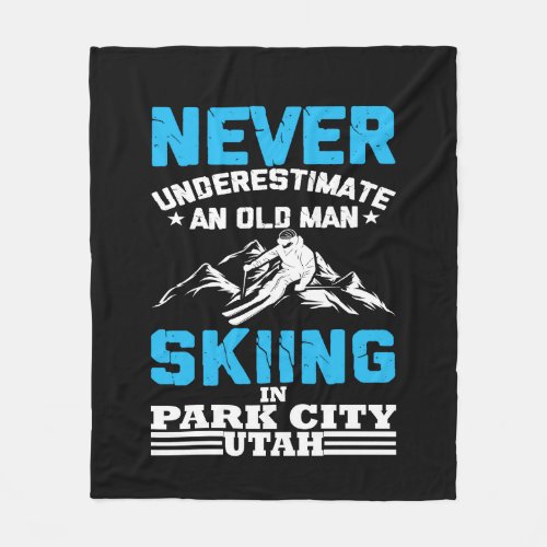 Never underestimate an old man skiing in Utah Fleece Blanket