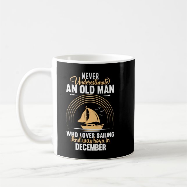 Never underestimate an old man who loves sailing coffee mug (Left)