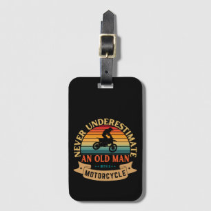 Never underestimate an old man with a motorcycle luggage tag