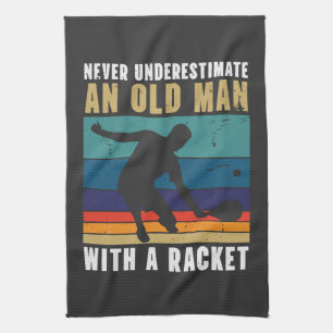 Never underestimate an old man with a pickleball kitchen towel