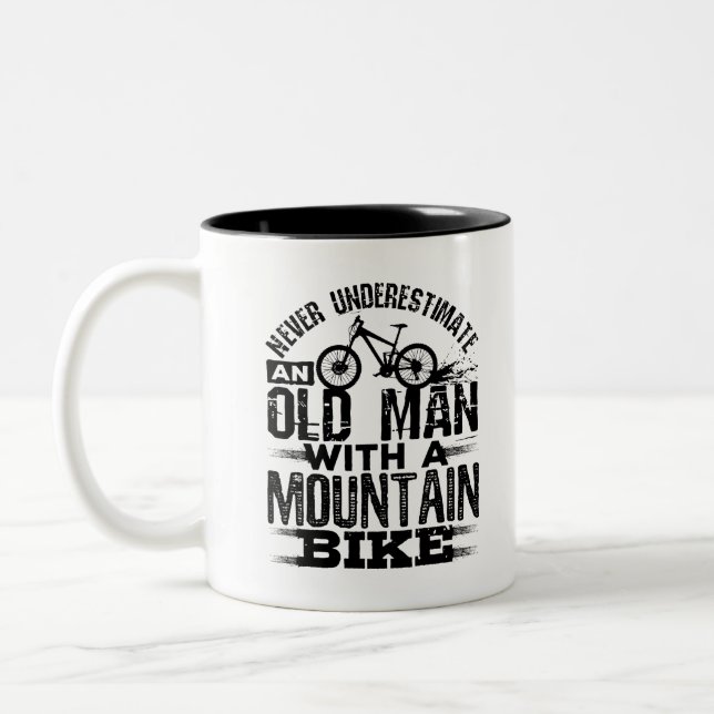Never Underestimate An Old Man with Mountain Bike Two-Tone Coffee Mug (Left)