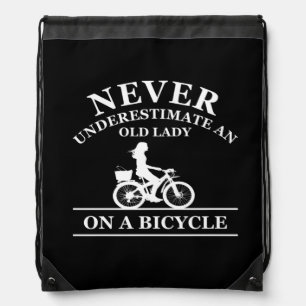 never underestimate an old woman on a bicycle drawstring bag