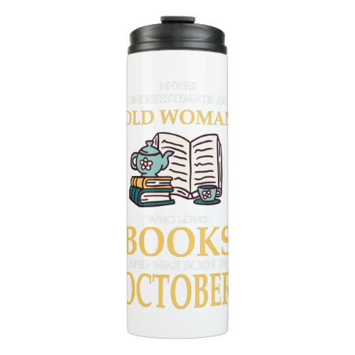 NEVER UNDERESTIMATE AN OLD WOMAN WHO LOVES BOOKS THERMAL TUMBLER