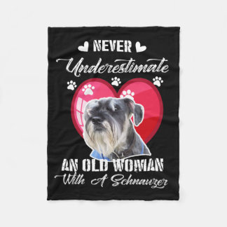 Never Underestimate an old woman with a schnauzer Fleece Blanket