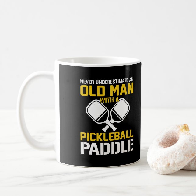 Never Underestimate and Old Man with a Pickleball  Coffee Mug (With Donut)