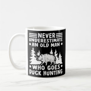 Never underestimate duck hunting ducks  coffee mug