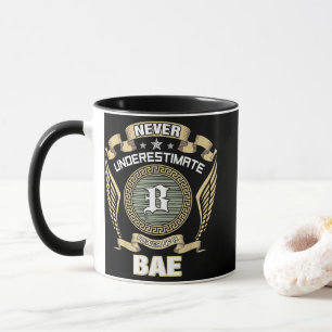 NEVER_UNDERESTIMATE_POWER_OF_A_BAE MUG