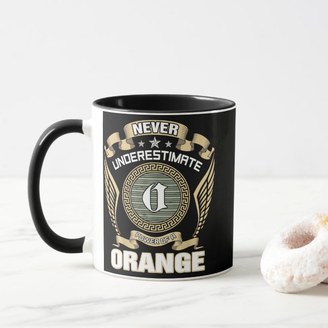 NEVER_UNDERESTIMATE_POWER_OF_A_ORANGE MUG (With Donut)