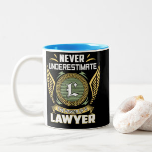 Never Underestimate The Power Of A Lawyer Two-Tone Coffee Mug
