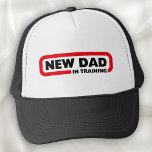 New Dad in Training - Funny Trucker Hat<br><div class="desc">Babies don't come with an instruction manual,  so fatherhood can take some getting used to. Let everyone know what stage you're at with this playful New Dad in Training sign. Simple text with a bright red outline.

A lighthearted gift for all new fathers. All dads have a first time!</div>