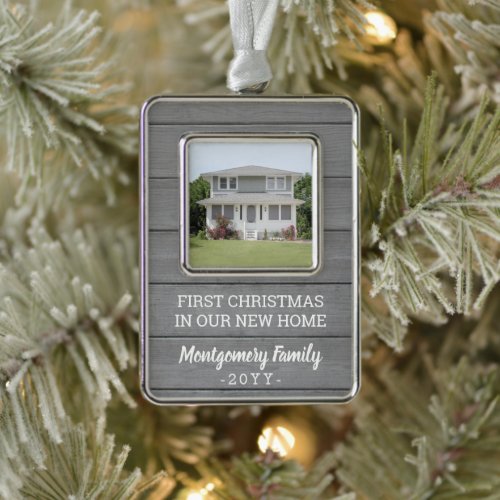New Home Picture Housewarming Faux Gray Wood First Christmas Ornament - Celebrate the joy of your new place with a custom  photo "First Christmas in our New Home" rectangular metal ornament. Text and picture on this template are simple to personalize for any occasion. (IMAGE DESIGN TIP: To center the photo exactly how you want, crop it into a square shape before uploading to the Zazzle website.) Modern farmhouse style design features a rustic grey faux wood background, stylish script and typewriter typography name and year, and 1 square image of your choice. This unique family keepsake adds an elegant touch to Xmas home decorations or makes a thoughtful housewarming realtor gift idea. There's no place like a new home for the holidays!