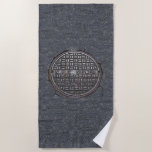 New York City Sewer Cover And Asphalt Pavement Nyc Beach Towel at Zazzle