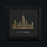 New York City Skyline Gold Line Art Gift Box<br><div class="desc">A clean and elegant graphic illustration featuring the iconic New York City skyline. Key landmarks like the Empire State Building and the Statue of Liberty are rendered in a minimalist, golden line art style. The text "NEW YORK" is written in a matching golden font below the cityscape. The design is...</div>