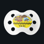 New York Taxi Dog Pacifier<br><div class="desc">A dog is driving a taxi in New York. His child is riding in the back seat</div>