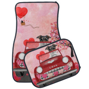 Newfoundland in car with hearts car floor mat