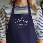 Newlywed Bride Personalized Navy Blue Apron<br><div class="desc">For the bride and groom, this navy blue apron features "Mrs." in a modern script font along with a last name and established date. This is a perfect bridal shower or wedding gift. These Mrs. and Mr. aprons are available in a variety of colors and can be also customized to...</div>