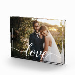 Newlywed Love Keepsake Wedding Photo Custom<br><div class="desc">Delight the newlyweds with a truly memorable gift—this Elegant Custom Wedding Photo Block featuring a stylish love script with long-tailed swashes. This chic and modern keepsake is designed to beautifully display their favorite wedding photo, creating a timeless piece they will cherish forever. Perfect for decorating their home with a touch...</div>
