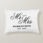 Newlywed Mr and Mrs elegant typography Accent Pillow<br><div class="desc">Newlywed Mr and Mrs elegant typography Accent Pillow.
Stylish home decor for newlyweds,  bride and groom,  husband and wife,  wedding couple or honeymooners..
Pretty double sided decoration cushion for sofa,  bed or couch.
Black and white or custom custom colors personalized with surname and date of marriage.
Zippered throw pillows.</div>