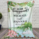 Newlyweds' Honeymoon Blanket with Swans   Flowers<br><div class="desc">Gorgeous wedding honeymoon blanket for the newlyweds. Design features a beautiful lagoon with male and female swans and blush landscape with flowers matched with super cute trendy script font that says "On our honeymoon." This makes a great gift for the new Mr. and Mrs. or for yourself if you are...</div>