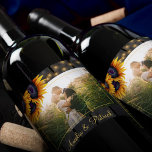 Newlyweds rustic wood sunflowers wedding photo wine label<br><div class="desc">Modern bride and groom wedding photo personalized wine label with a yellow gold sunflowers bouquet over a dark brown barn wood with string lights.            Easy to customize with your names!           It can be a pretty gift for the newlyweds or a wedding thank you favor.</div>