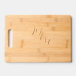 Newlyweds Simple Elegant Engraved Chopping Cutting Board<br><div class="desc">Newlyweds can now enjoy the charm of a Simple Elegant Engraved Chopping Cutting Board. This exquisite piece features elegant lettering, showcasing the newlyweds' monogrammed initials and their new family name. With its simple, minimalist design, this cutting board exudes a timeless elegance. It offers two types of script typography and calligraphy,...</div>