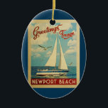 Newport Beach Sailboat Vintage Travel California Ceramic Ornament<br><div class="desc">This Greetings From Newport Beach California vintage travel nautical design features a boat sailing on the water with seagulls and a blue sky filled with gorgeous puffy white clouds.</div>