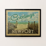Newport Beach Vintage Travel Jigsaw Puzzle<br><div class="desc">This Greetings From Newport vintage postcard design features a sandy beach with a beautiful turquoise ocean water and above the sea,  a blue sky with billowy white clouds. In vintage travels style.</div>