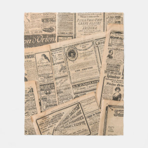 Newspaper pages with antique advertising. Vintage Fleece Blanket