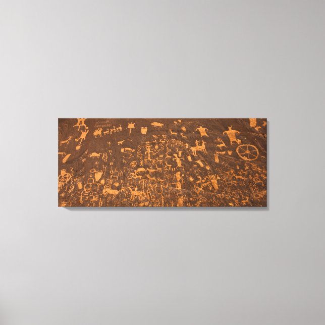 Newspaper Rock is a petroglyph panel etched in Canvas Print (Front)