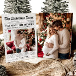 Newspaper Unique More the Merrier Baby Christmas Holiday Card<br><div class="desc">Our Newspaper Unique More the Merrier Baby Christmas Holiday Card is the perfect way to share your joyful news and holiday wishes with family and friends! Styled like a classic newspaper, this card captures the highlights of your year in a unique and charming format, featuring a festive design and sections...</div>