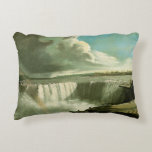 Niagara Falls From Table Rock by John Vanderlyn Accent Pillow<br><div class="desc">Niagara Falls From Table Rock by American neoclassicist painter John Vanderlyn, c. 1801. Vintage illustration travel fine art painting featuring an aerial view of Niagara Falls with the water cascading over the falls and creating a rainbow with the mist.. Niagara Falls is the collective name for three waterfalls (Horseshoe Falls,...</div>