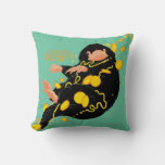 Niffler Floating With Gold Throw Pillow at Zazzle