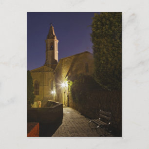Night view of church at dusk, Pienza, Italy Postcard