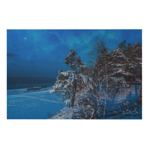 Nighttime winter scene with snow covered pines wood wall art