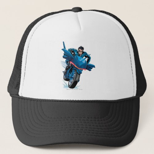 Nightwing rides bike trucker hat
