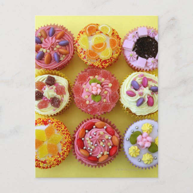 Nine cupcakes each decorated with candy in a postcard (Front)