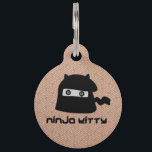 Ninja Kitty Pet ID Tag<br><div class="desc">A true ninja never reveals his secrets, like the art of hiding toys, the sneak attack from behind the furniture, how to properly knock over a glass of water, or how to dig and fill the perfect hole. Your kitty is king of his domain, and he won't think twice about...</div>