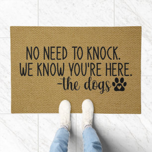 No need to knock. We know you're here - the dogs. Doormat