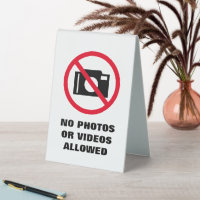 No photos or videos allowed camera warning