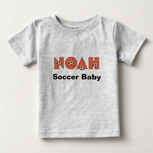 Noah in Soccer Orange Baby T-Shirt (Front)