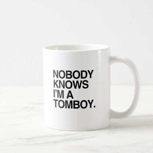 NOBODY KNOWS IM A TOMBOY _png Coffee Mug