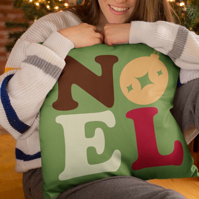 Noel Modern Festive Retro Typography Christmas Throw Pillow (This green pillow in retro colors spells out Noel in vintage typography.)