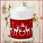 Nordic Christmas Reindeers White Santa Helpers Red Teapot<br><div class="desc">Christmas Tea time will never be the same again with this custom tea pot made of bright white porcelain. Artistic & beautiful white reindeers are waiting for Santa's call. Personalized Quote Christmas Message with illustrations of white Christmas Reindeers on a deep red background. This cute teapot deliver's the message and...</div>