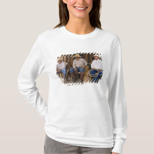 North America, USA. Cowboys relaxing and T-Shirt