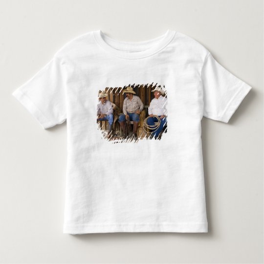 North America, USA. Cowboys relaxing and Toddler T-shirt