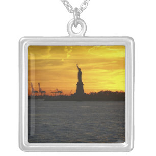 North America, USA, New York, New York City. 3 Silver Plated Necklace