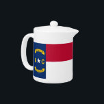 North Carolina State Flag Teapot<br><div class="desc">Add a touch of state pride to your tea time with our exclusive teapot featuring the flag of North Carolina! This teapot combines functionality with cultural pride, making it more than just a kitchen accessory; it’s a celebration of North Carolina’s rich heritage and vibrant identity. The distinctive design prominently displays...</div>