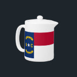 North Carolina State Flag Teapot<br><div class="desc">Add a touch of state pride to your tea time with our exclusive teapot featuring the flag of North Carolina! This teapot combines functionality with cultural pride, making it more than just a kitchen accessory; it’s a celebration of North Carolina’s rich heritage and vibrant identity. The distinctive design prominently displays...</div>