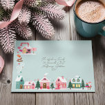 North Pole Elf Workshop Santa Claus Pink Village Envelope<br><div class="desc">Step into the heart of the North Pole with our cozy and whimsical Christmas envelope design! This festive envelope sets the tone for holiday magic before it’s even opened, featuring a beautifully illustrated outdoor scene straight from Santa’s workshop. Our original hand-drawn artwork captures the joyful hustle and bustle of the...</div>
